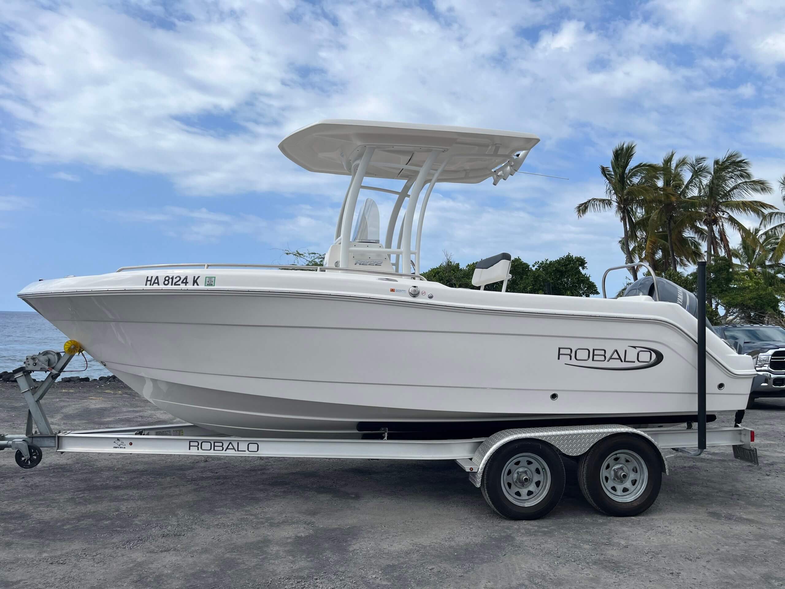 Newly purchased Robalo speed boat on a trailer